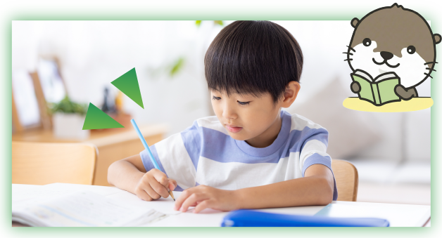 読み書きをする子供の写真